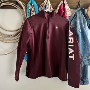 Maroon woman’s Ariat quarter zip sweater